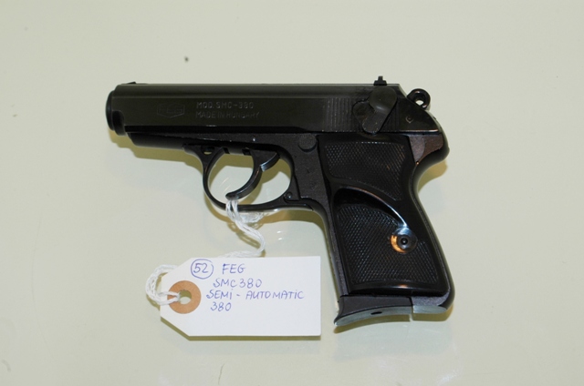 48. .380 ACP–FEG semi-auto model SMC-380 52