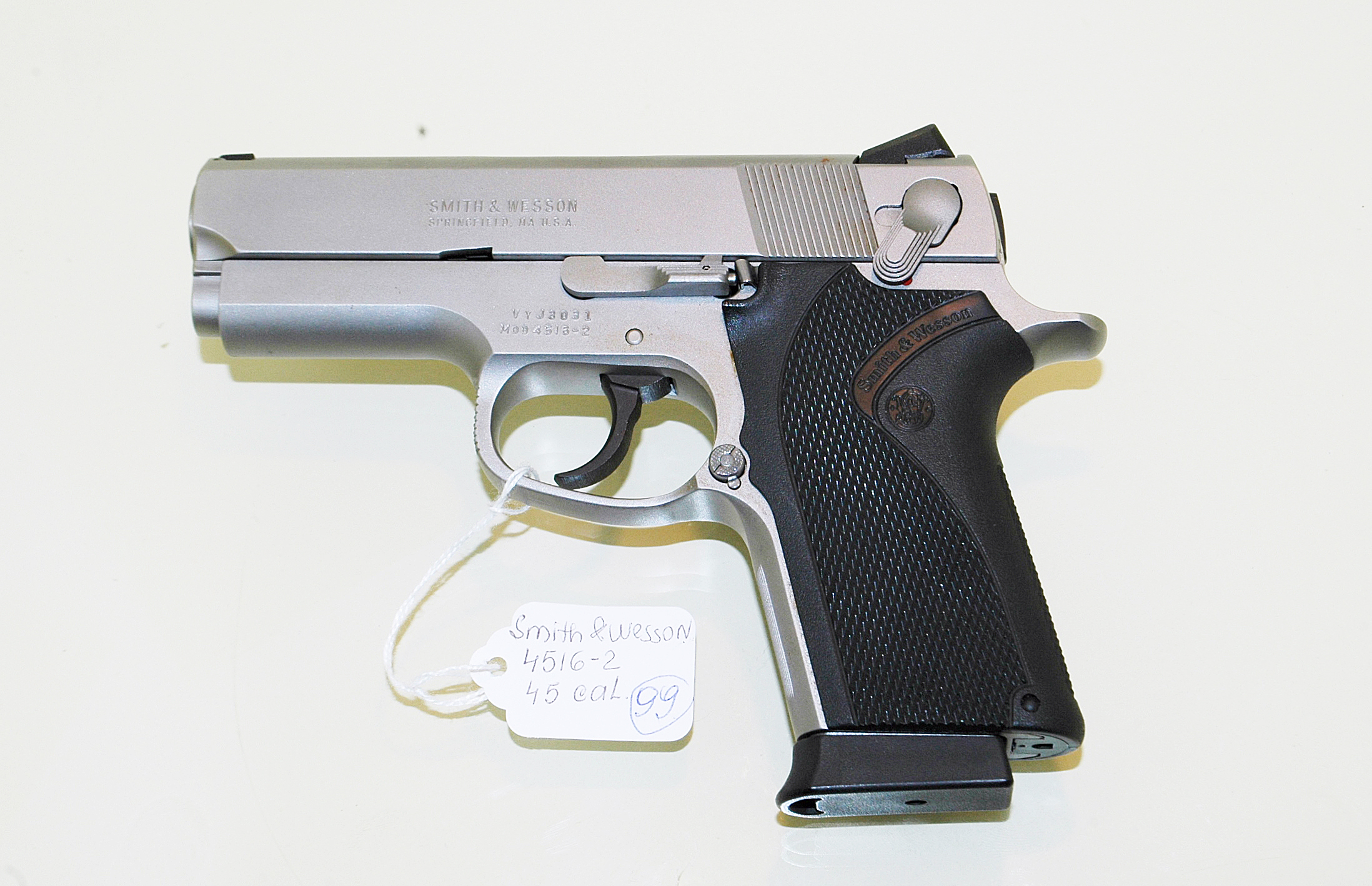 56. Smith and Wesson semi-auto model 4516 compact stainless 99